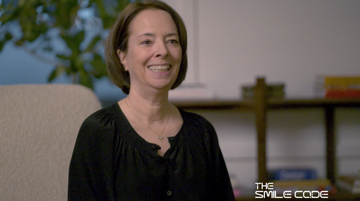 Lucy smiling in her testimonial video